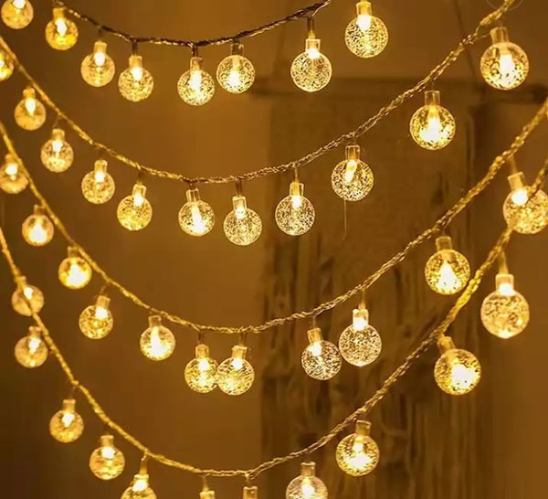 LED lodīšu ķēdes apgaismojums 10m 100LED silti balta