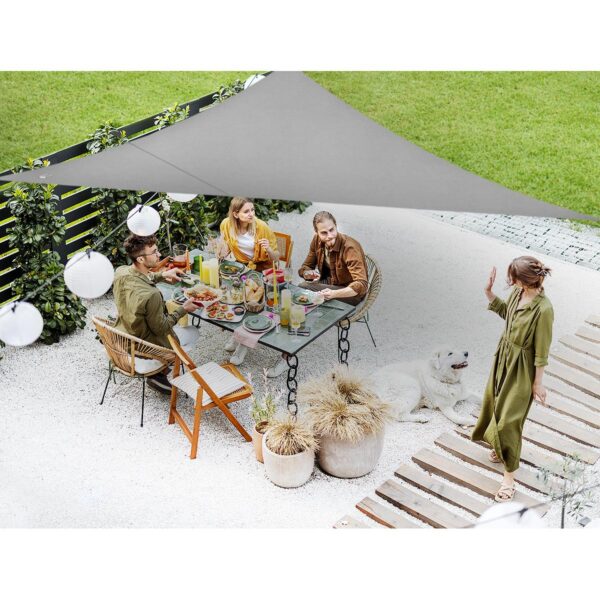 Top view on a beautiful backyard with people dining Top view on a beautiful backyard with people dining