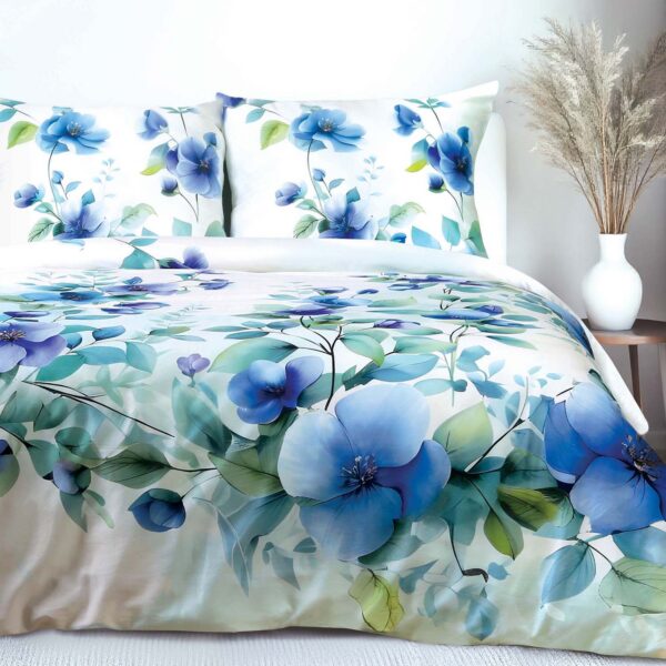 Minimalist bedroom with a plush white bed covered in a soft blue Minimalist bedroom with a plush white bed covered in a soft blue