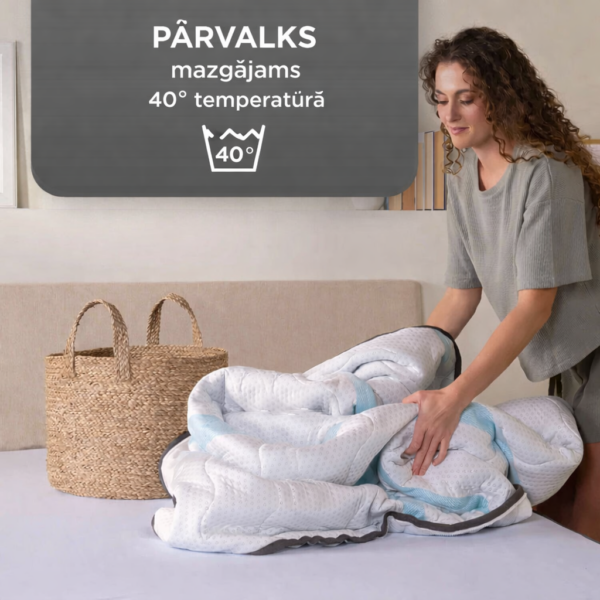 Woman tending to quilt with text overlay Woman tending to quilt with text overlay