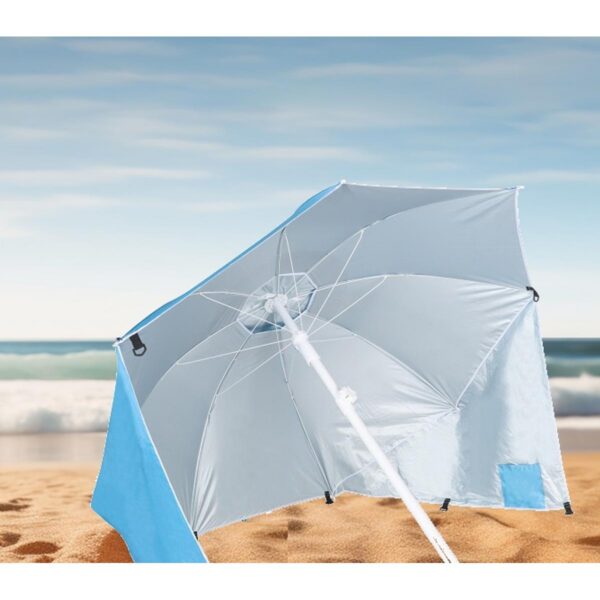 Surfboard in the sand, ocean waves behind. Surfboard in the sand, ocean waves behind.